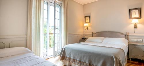 Habitación doble con balcón del hotel Alcázar - Irún Centro. Foto 10