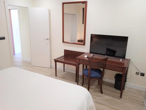 Habitación Cuádruple con balcón del hotel 153. Foto 10