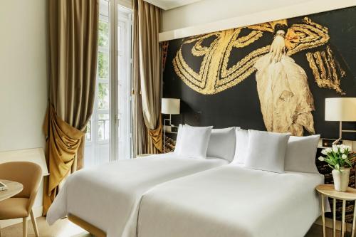 Habitación Premier del hotel Gran Melia Palacio de los Duques. Foto 1
