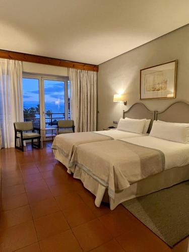 Habitación doble Con Vistas 2 Camas individuales Normal del hotel Parador De Ceuta La Muralla. Foto 3