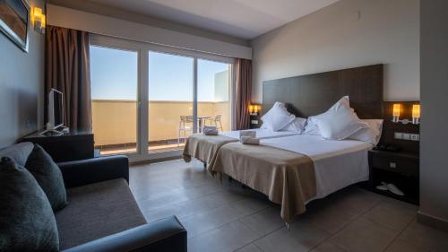 Habitación Doble Élite con vistas al mar del hotel Pato Amarillo. Foto 5