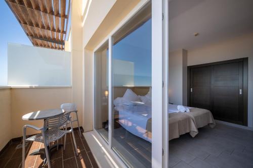 Habitación Doble Élite con vistas al mar del hotel Pato Amarillo. Foto 6