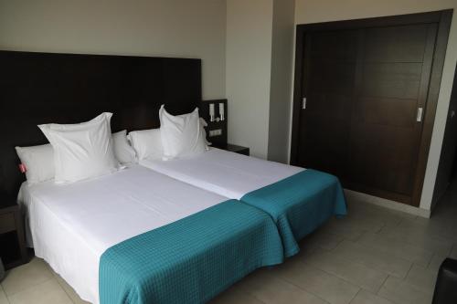 Habitación Doble Básica - 2 camas del hotel Pato Amarillo. Foto 2