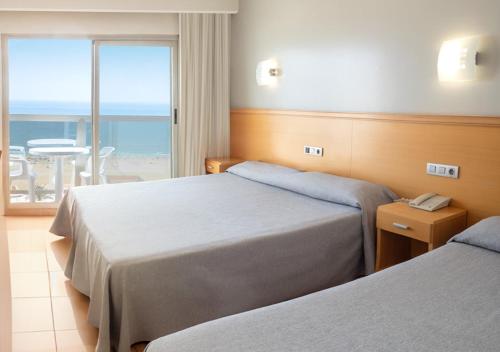 Habitación Cuádruple del hotel Rh Gijón. Foto 3
