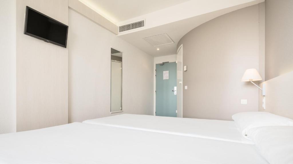 Habitación doble 2 camas del hotel Ilunion Valencia 3. Foto 2