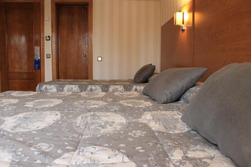 Habitación Doble con cama supletoria del hotel Ramblas Barcelona. Foto 11