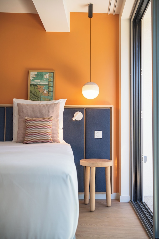 Habitación Clásica con 1 cama queen y vistas al mar del hotel Domaine des Grands Sables Île Groix - Handwritten Collection. Foto 1