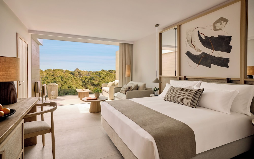 Habitación familiar, vistas al jardín del hotel Ikos Porto Petro