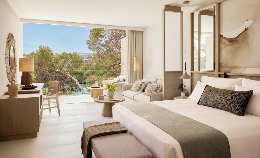 Suite junior, vistas parciales al mar (Deluxe) del hotel Ikos Porto Petro