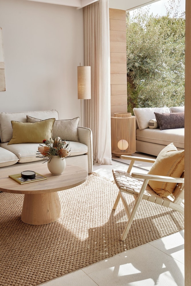 Suite Deluxe, 1 habitación, vistas al jardín del hotel Ikos Porto Petro. Foto 3
