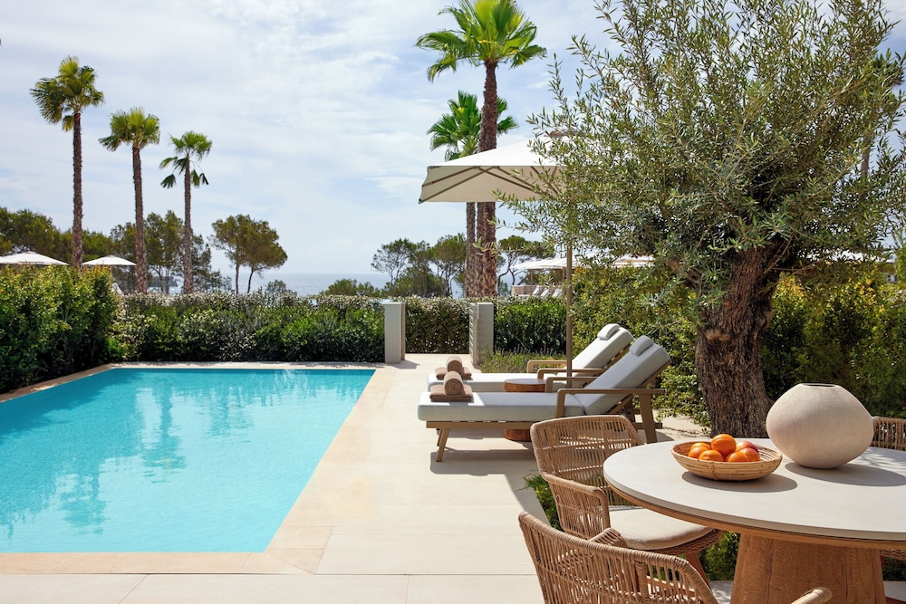 Suite Deluxe, 1 habitación, piscina privada, vistas al jardín del hotel Ikos Porto Petro. Foto 2