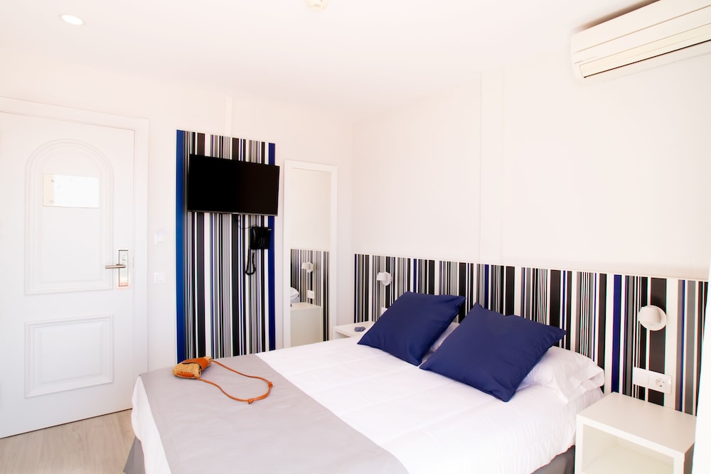 Habitación triple estándar (2+1) del hotel Ibersol Sorra d'Or. Foto 2