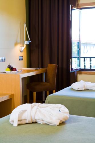 Habitación Triple del hotel Iberik Balneario Augas Santas. Foto 4