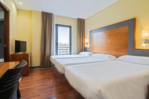 Habitación Doble con cama supletoria - 1 o 2 camas del hotel Fandg Logroño. Foto 3