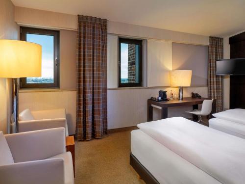 Habitación Doble Clásica - 2 camas del hotel Mövenpick Hamburg. Foto 2