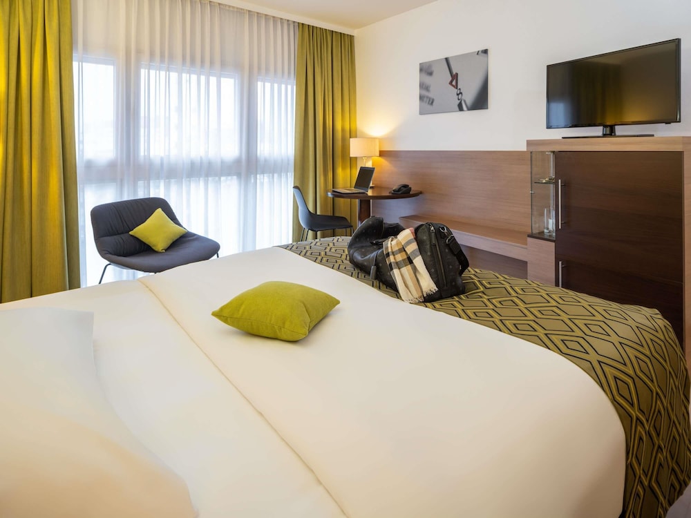 Habitación Estándar con una cama doble o dos camas individuales del hotel Mercure Graz City. Foto 8