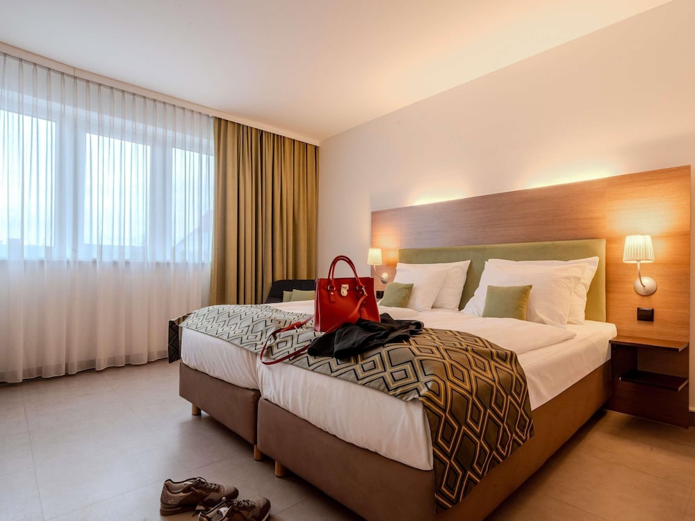 Habitación Estándar con una cama doble o dos camas individuales del hotel Mercure Graz City. Foto 10