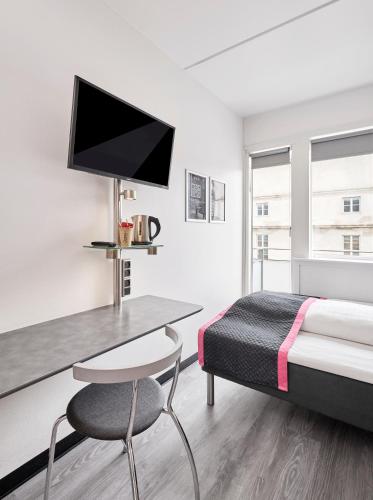 Habitación Estándar - 1 cama grande del hotel Cabinn City. Foto 1