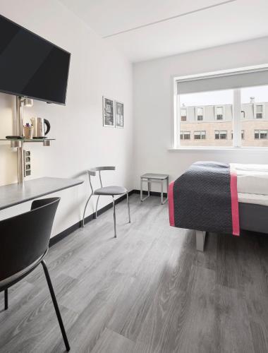 Habitación Capitán del hotel Cabinn City. Foto 1