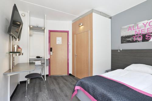 Habitación Capitán del hotel Cabinn City. Foto 2