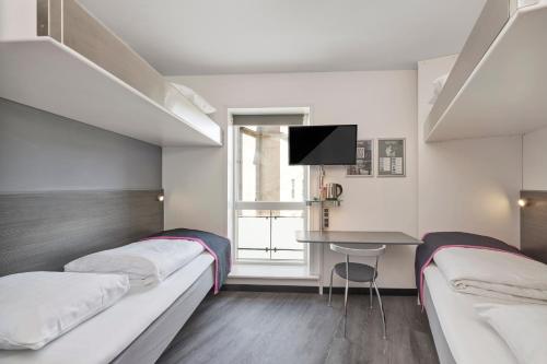 Habitación Familiar del hotel Cabinn City. Foto 2