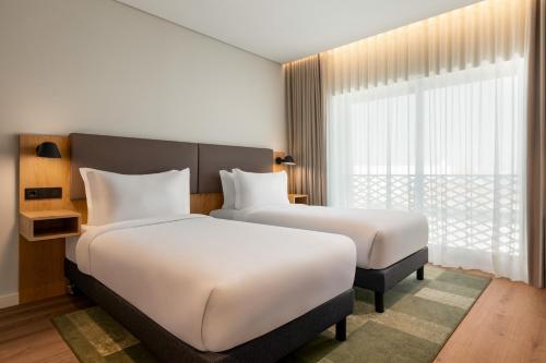 Habitación Doble Premium con sofá cama - 2 camas del hotel Holiday Inn Beja, an IHG. Foto 3