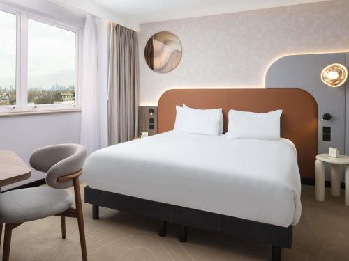 Suite Junior con vistas a la ciudad - 1 cama extragrande - Planta superior del hotel Mercure London Earls Court. Foto 5