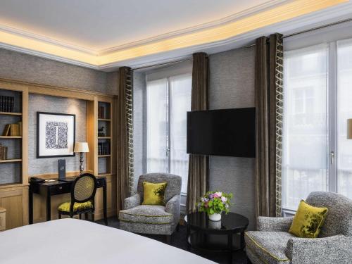 Luxury Junior King Suite with Balcony and Eiffel Tower View del hotel Sofitel Paris Baltimore Tour Eiffel. Foto 2