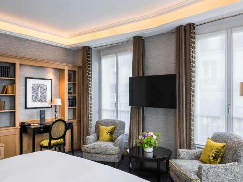 Suite Junior Doble de lujo - 1 cama extragrande del hotel Sofitel Paris Baltimore Tour Eiffel. Foto 3