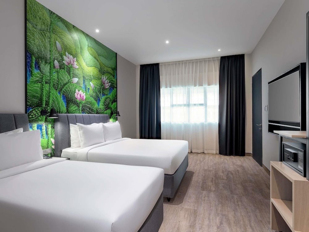 Habitación Familiar con 1 cama queen + 1 cama individual del hotel Ibis Styles Sepang Klia