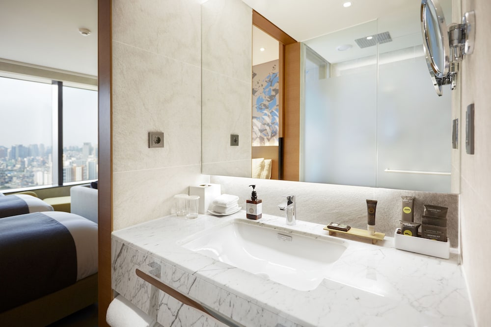 Suite Junior con 2 camas individuales del hotel Novotel Suites Ambassador Seoul Yongsan - Seoul Dragon City. Foto 3