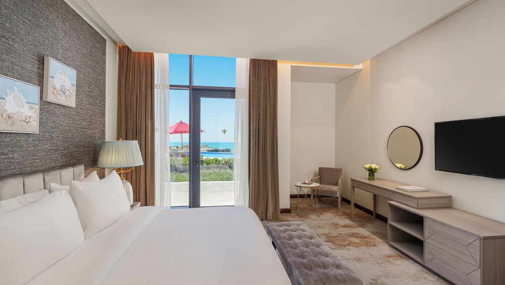 Habitación Deluxe, 1 cama de matrimonio grande del hotel Rixos Premium Alamein. Foto 1