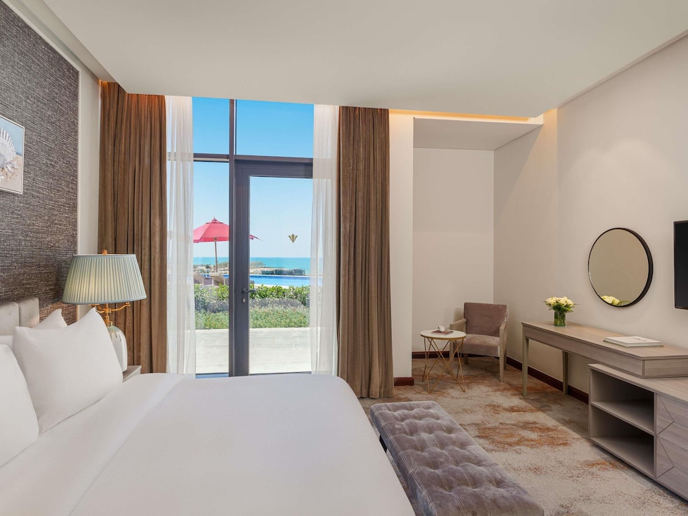Habitación Deluxe, 1 cama de matrimonio grande del hotel Rixos Premium Alamein. Foto 3