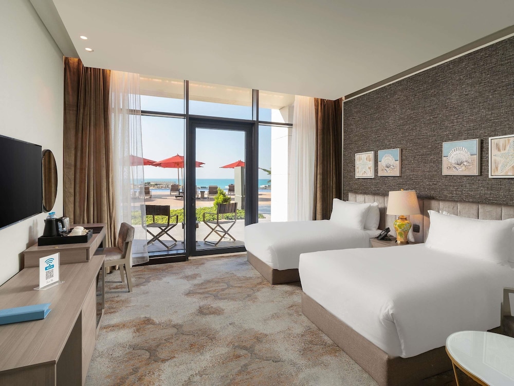 Habitación Deluxe, 2 camas individuales del hotel Rixos Premium Alamein. Foto 4
