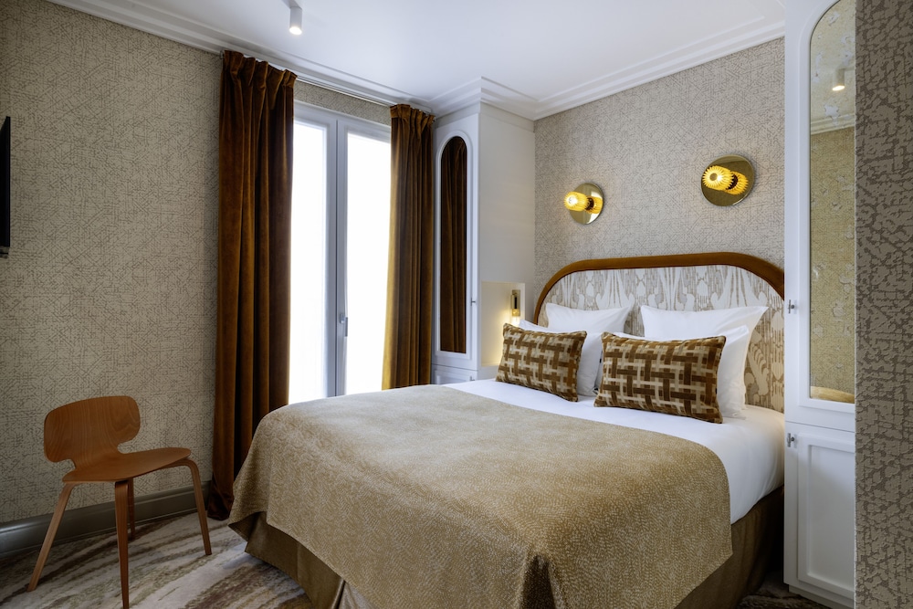 Habitación Familiar del hotel des Carmes By Malone. Foto 8
