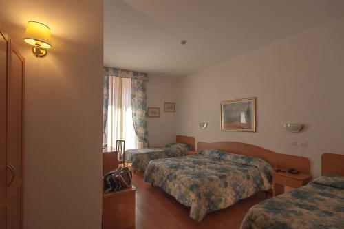 Habitación Cuádruple del hotel Tirreno