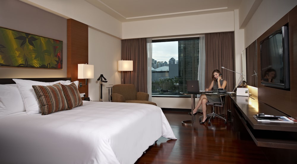 Habitación Club, 1 cama de matrimonio grande (Deluxe) del hotel Impiana Klcc. Foto 1