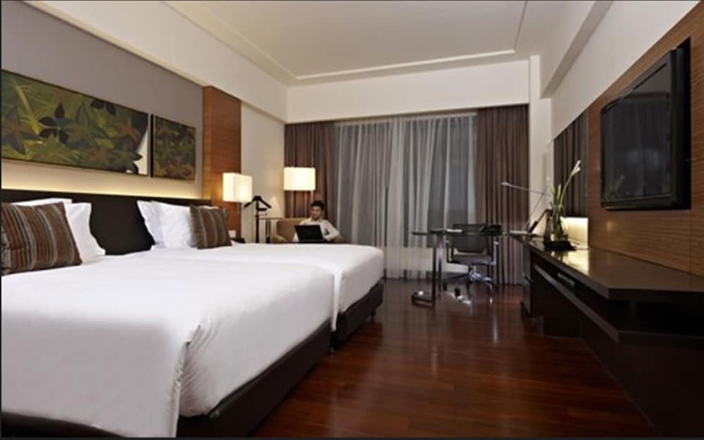 Habitación Club, 2 camas individuales (Deluxe) del hotel Impiana Klcc. Foto 2