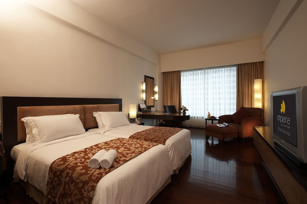 Habitación Deluxe con 2 camas individuales del hotel Impiana Klcc. Foto 1