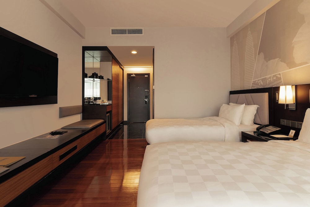 Habitación Deluxe con 2 camas individuales del hotel Impiana Klcc. Foto 4