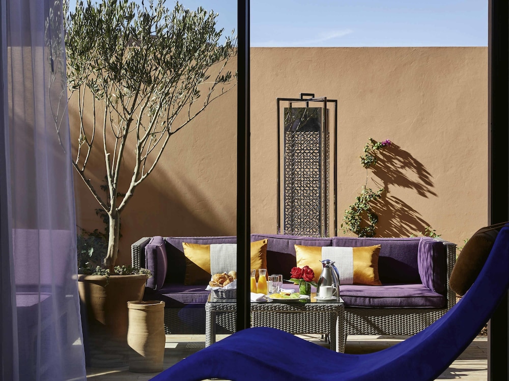 Habitación Deluxe, 1 cama de matrimonio grande, vistas al jardín del hotel Mövenpick Mansour Eddahbi Marrakech. Foto 5