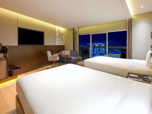 Executive Prestige, 2 Doubles, Lounge Access, High Floor, Balcony, Marina Bay View del hotel Swissotel The Stamford, Singapore. Foto 6