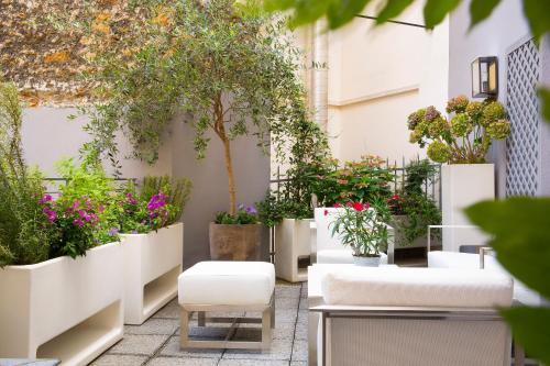 Suite con balcón del hotel Baume. Foto 1