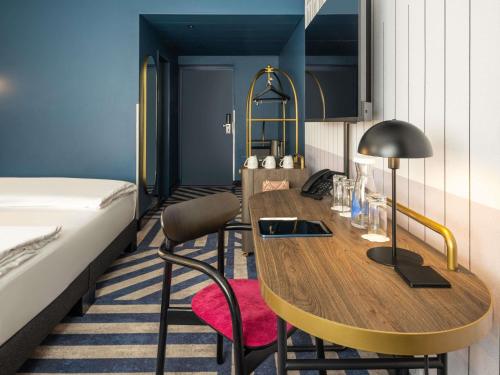 Habitación Superior con cama extragrande del hotel Mercure Wien City. Foto 8