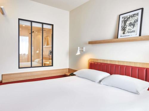 Habitación Standard con cama doble del hotel ibis Styles La Roche-sur-Yon. Foto 7