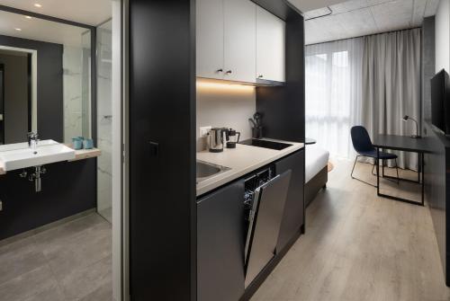 Suite Estudio Superior del hotel Radisson and Suites Zurich. Foto 2