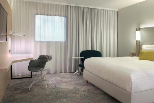 Habitación Familiar Grande con desayuno y enlace gratuito con el aeropuerto del hotel The Jangle Hotel - Paris - Charles de Gaulle - Airport. Foto 3