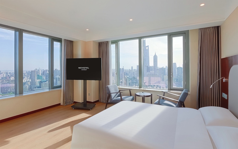 Suite junior, 1 cama de matrimonio grande del hotel Novotel Shanghai Atlantis. Foto 1