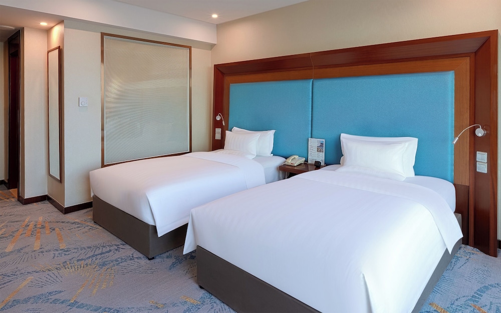 Habitación estándar, 2 camas individuales del hotel Novotel Shanghai Atlantis. Foto 2
