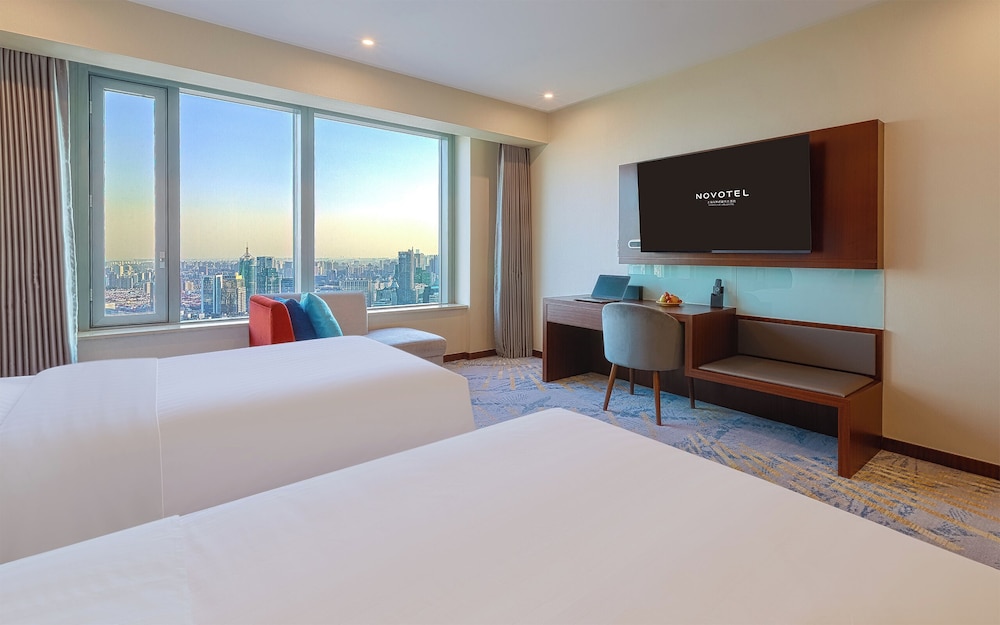 Habitación estándar, 2 camas individuales del hotel Novotel Shanghai Atlantis. Foto 3
